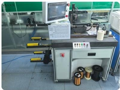 自动跨槽绕线机